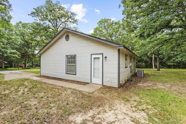 453 County Road 2521, Bonham, TX 75418 - back of property with central AC