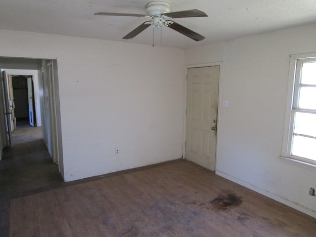 5265 S 7th St, Abilene, TX 79605 - spare room with wood finished floors, plenty of natural light, a ceiling fan, and baseboards