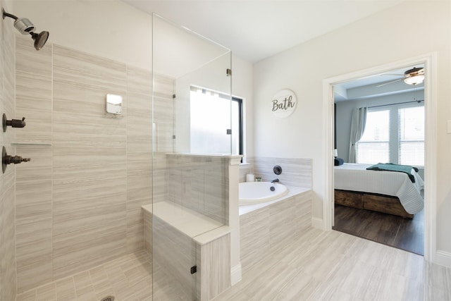 664 Fletcher Dr, Fate, TX 75087 - full bathroom featuring connected bathroom, a stall shower, and a garden tub