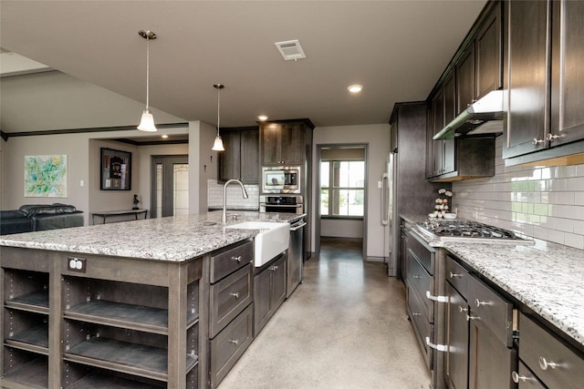 14447 Warbler Ln, Haslet, TX 76052 - kitchen featuring appliances with stainless steel finishes, under cabinet range hood, tasteful backsplash, dark brown cabinets, and recessed lighting
