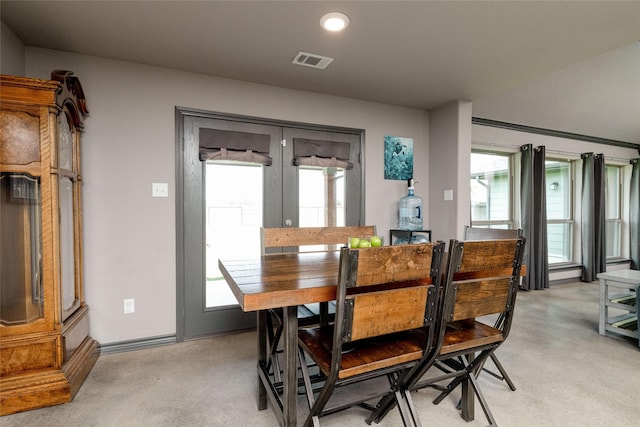 14447 Warbler Ln, Haslet, TX 76052 - dining area with light colored carpet, recessed lighting, and french doors