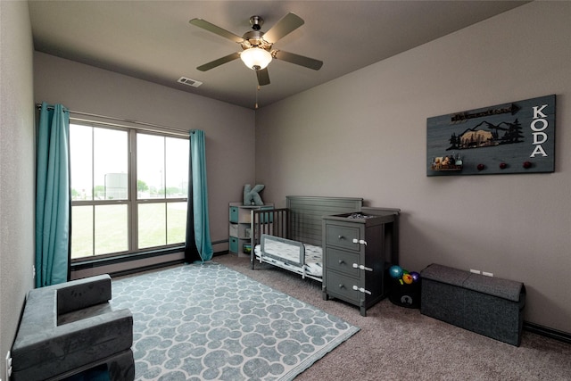 14447 Warbler Ln, Haslet, TX 76052 - living area featuring carpet floors, ceiling fan, and baseboard heating