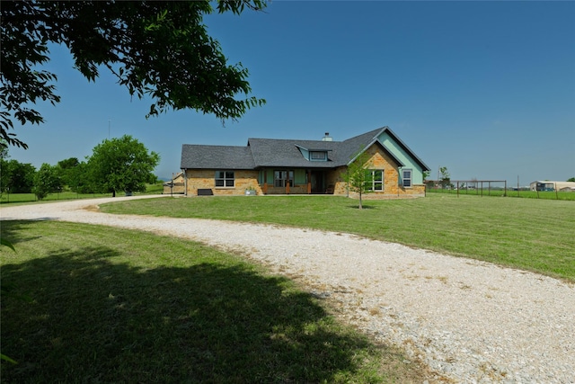 14447 Warbler Ln, Haslet, TX 76052 - view of front of house with a front yard and curved driveway