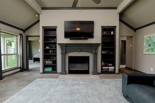 14447 Warbler Ln, Haslet, TX 76052 - living area featuring ceiling fan, carpet flooring, a tiled fireplace, crown molding, and built in shelves