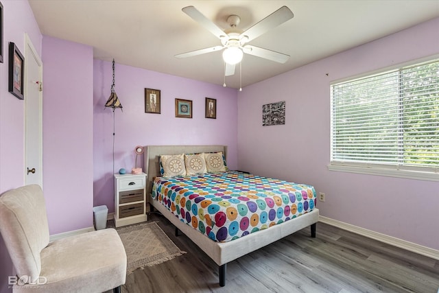 216 Settlers Park Dr, Shreveport, LA 71115 - bedroom featuring multiple windows, wood finished floors, and baseboards