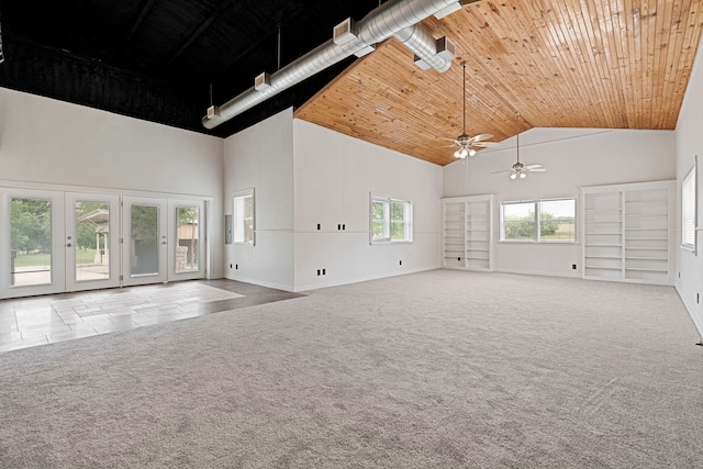 344 Clear Lake Ln, Weatherford, TX 76087 - carpeted empty room with high vaulted ceiling, ceiling fan, wooden ceiling, and baseboards
