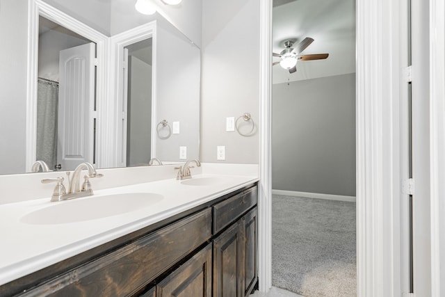 913 Colby Bluff Dr, Rockwall, TX 75087 - bathroom featuring double vanity and a ceiling fan