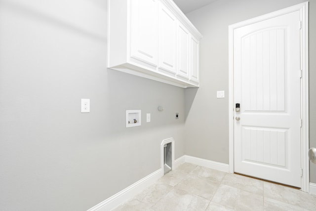 913 Colby Bluff Dr, Rockwall, TX 75087 - laundry room with hookup for an electric dryer, hookup for a washing machine, cabinet space, gas dryer hookup, and baseboards