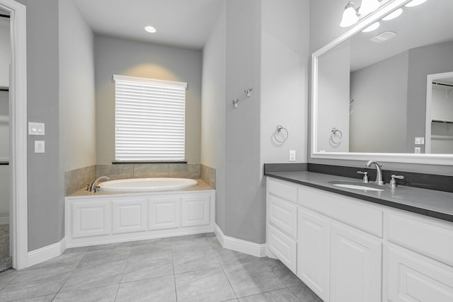 913 Colby Bluff Dr, Rockwall, TX 75087 - full bathroom with a bath, vanity, tile patterned floors, and baseboards
