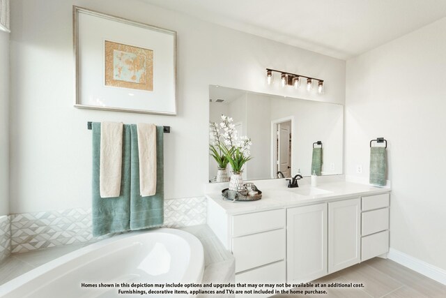 12605 Rocky Top Rd, Godley, TX 76044 - bathroom featuring a garden tub and vanity