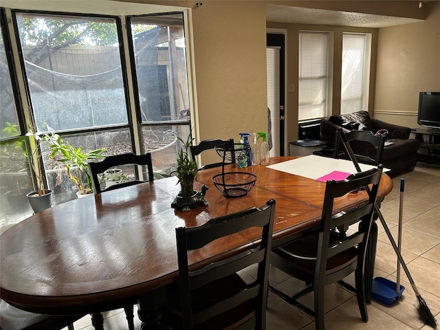 4138 Towngate Blvd, Garland, TX 75041 - dining space with light tile patterned floors
