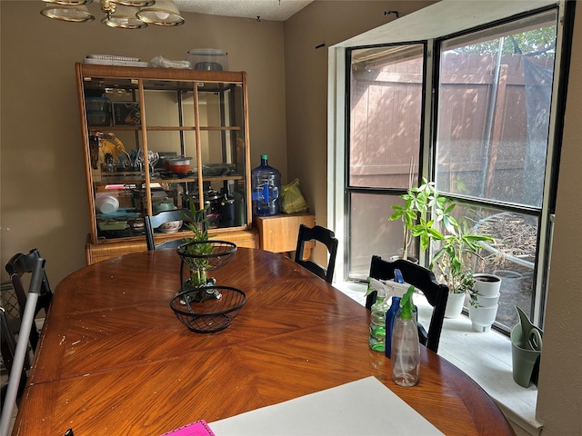 4138 Towngate Blvd, Garland, TX 75041 - dining area with a chandelier
