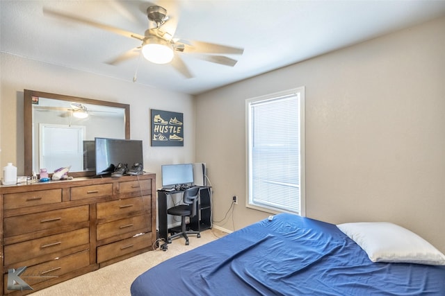 601 Westmoreland St, Abilene, TX 79603 - bedroom with light colored carpet, a desk, and ceiling fan