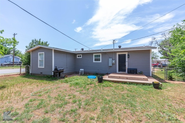 601 Westmoreland St, Abilene, TX 79603 - rear view of house featuring a deck and a gate