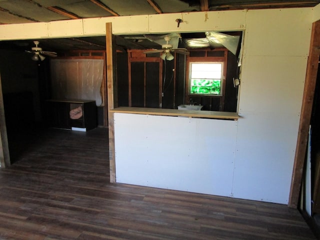 5349 Lamesa Ave, Abilene, TX 79605 - kitchen with dark wood-style floors, a ceiling fan, and a sink