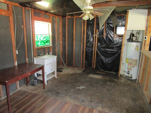 5349 Lamesa Ave, Abilene, TX 79605 - basement with gas water heater, ceiling fan, and a sink