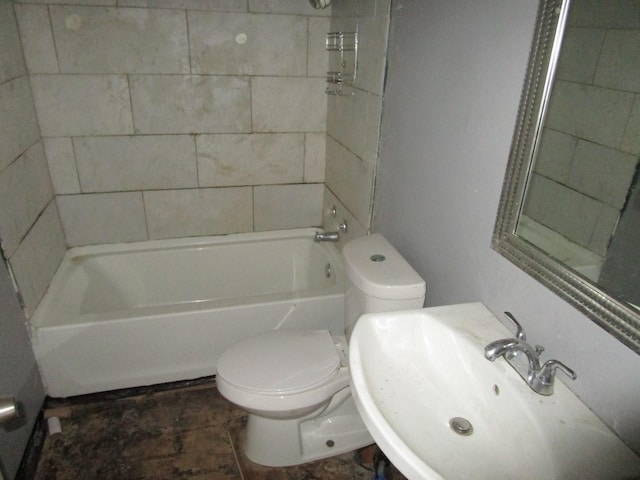 5349 Lamesa Ave, Abilene, TX 79605 - bathroom with a sink, toilet, and shower / tub combination