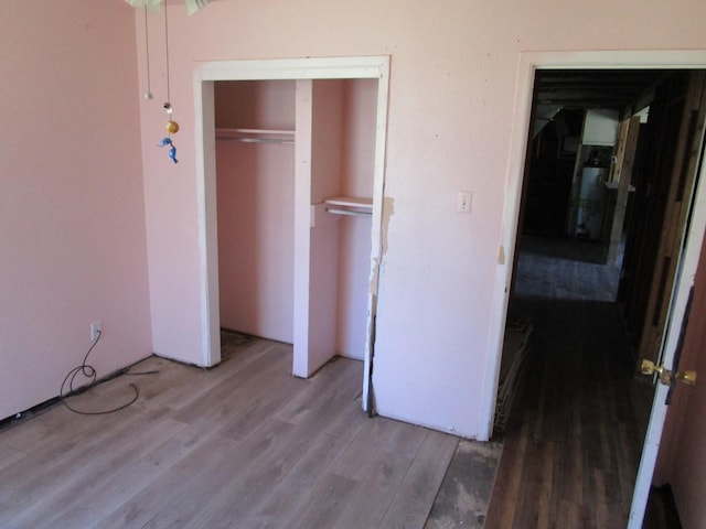 5349 Lamesa Ave, Abilene, TX 79605 - unfurnished bedroom featuring wood finished floors and a closet