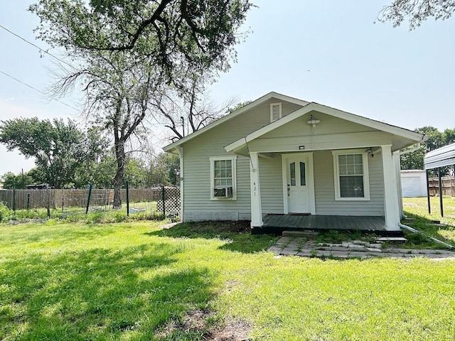 421 Jackson St, Krum, TX 76249 - view of front facade featuring a porch and cooling unit