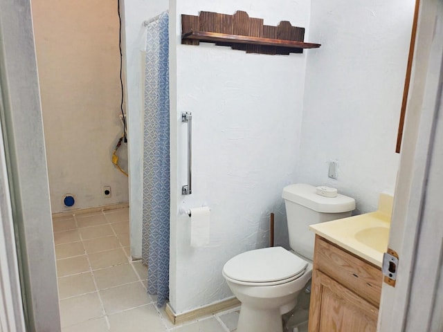 421 Jackson St, Krum, TX 76249 - bathroom with vanity, tile patterned floors, toilet, and curtained shower