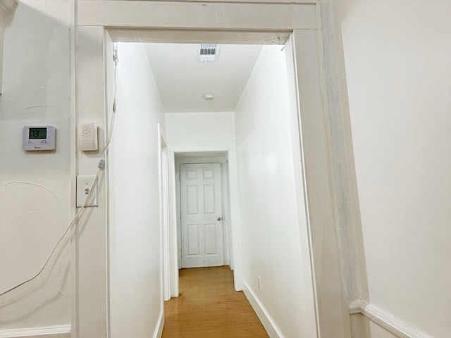 421 Jackson St, Krum, TX 76249 - hallway featuring light wood-style flooring and baseboards