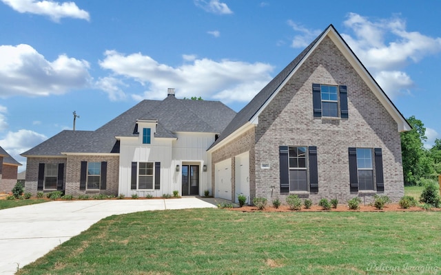 507 Cocodrie Dr, Bossier City, LA 71112 - view of front of house with brick siding, driveway, board and batten siding, and a garage