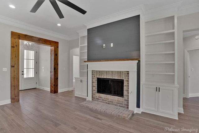507 Cocodrie Dr, Bossier City, LA 71112 - unfurnished living room with ceiling fan, baseboards, light wood-style flooring, ornamental molding, and recessed lighting