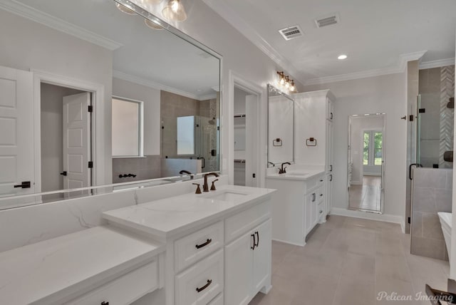 507 Cocodrie Dr, Bossier City, LA 71112 - full bathroom with a shower stall, two vanities, crown molding, recessed lighting, and tile patterned flooring