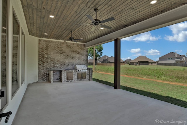 507 Cocodrie Dr, Bossier City, LA 71112 - view of patio / terrace featuring a ceiling fan, a sink, and a residential view