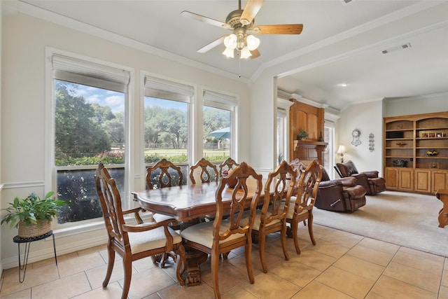 104 E Hidden Meadow Ct, Cresson, TX 76035 - dining room with healthy amount of natural light, light tile patterned floors, crown molding, a ceiling fan, and light carpet
