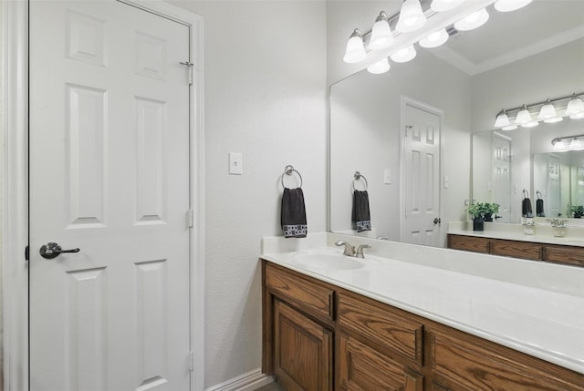 104 E Hidden Meadow Ct, Cresson, TX 76035 - bathroom featuring vanity and ornamental molding