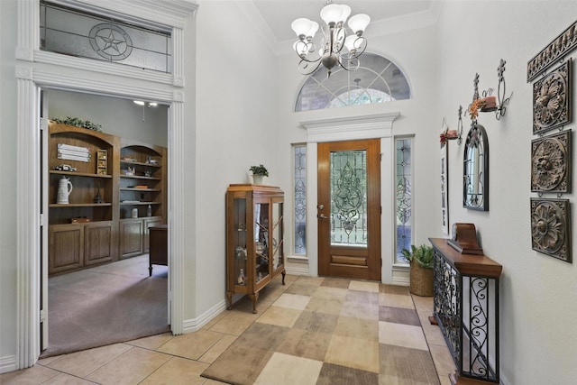 104 E Hidden Meadow Ct, Cresson, TX 76035 - foyer entrance with light tile patterned flooring, a chandelier, crown molding, baseboards, and light carpet