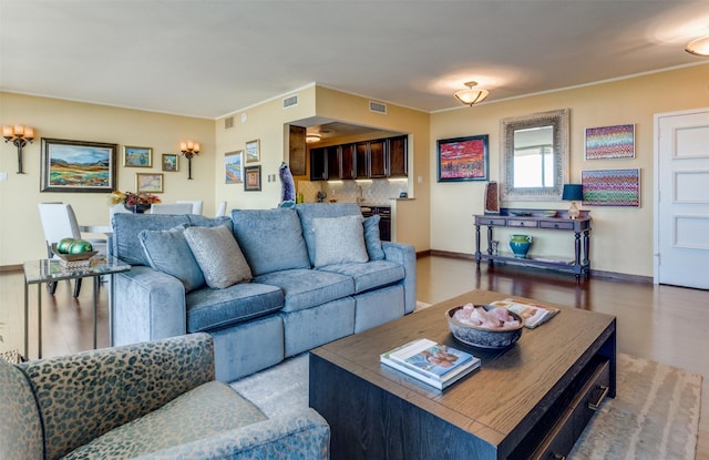 6211 W NW Hwy Unit 1504, Dallas, TX 75225 - living room featuring baseboards