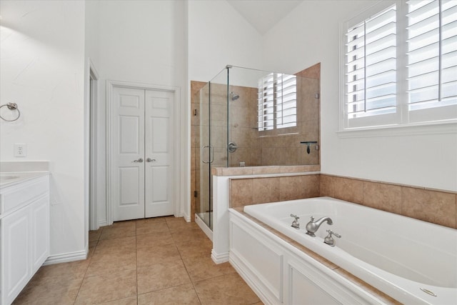 1127 Westminster Ave, Murphy, TX 75094 - full bathroom featuring a bath, a shower stall, vanity, and tile patterned flooring