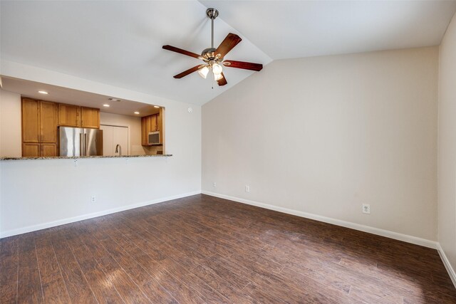 14277 Preston Rd Unit 524, Dallas, TX 75254 - unfurnished living room with lofted ceiling, dark wood-style flooring, a ceiling fan, baseboards, and recessed lighting
