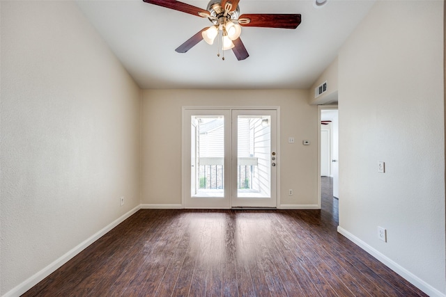 14277 Preston Rd Unit 524, Dallas, TX 75254 - unfurnished room featuring a ceiling fan, baseboards, and dark wood-type flooring