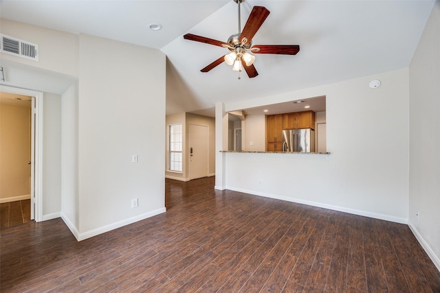 14277 Preston Rd Unit 524, Dallas, TX 75254 - unfurnished living room featuring ceiling fan, lofted ceiling, baseboards, dark wood-type flooring, and recessed lighting