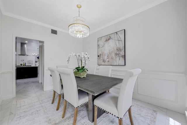 9320 Vista Cir, Irving, TX 75063 - dining room featuring a chandelier, ornamental molding, and light marble finish flooring