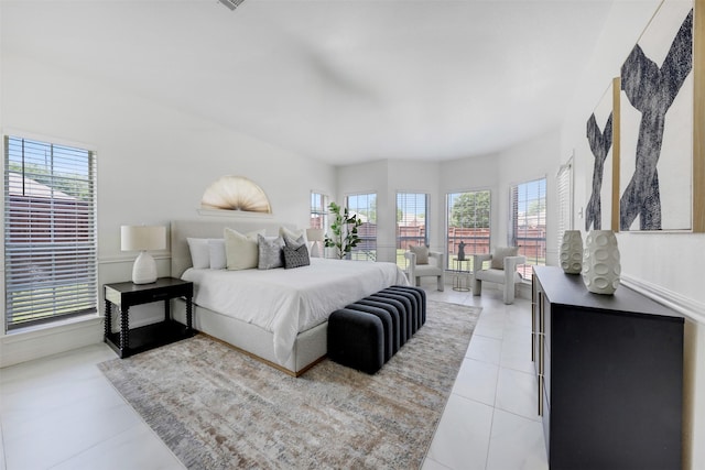 9320 Vista Cir, Irving, TX 75063 - bedroom with multiple windows and light tile patterned floors
