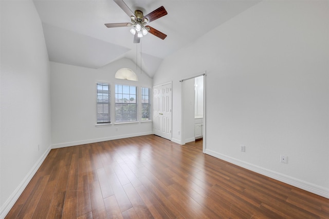 9320 Vista Cir, Irving, TX 75063 - unfurnished bedroom with lofted ceiling, dark wood-type flooring, baseboards, and ceiling fan