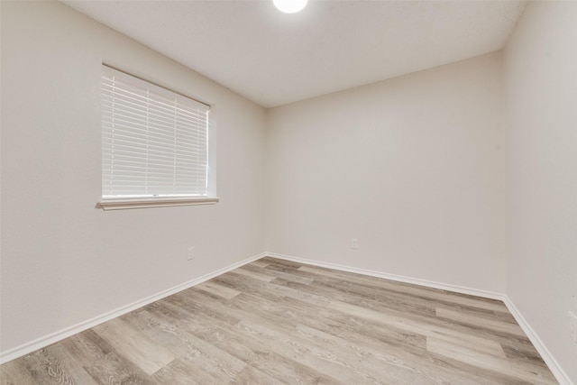 7616 Jamie Renee Ln, North Richland Hills, TX 76182 - spare room with light wood-style flooring and baseboards