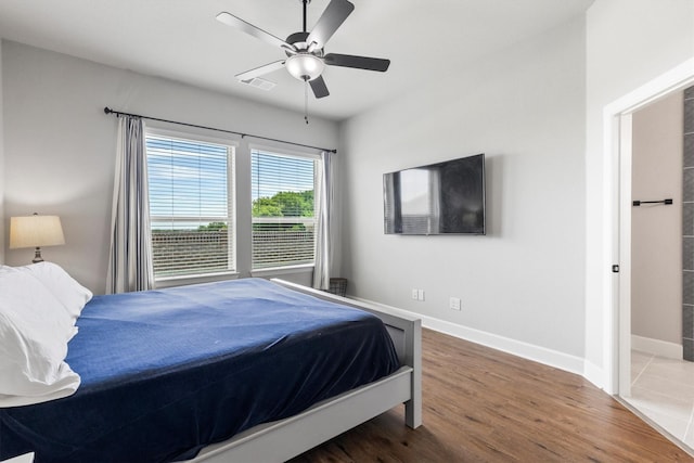 3817 Stonewood Dr, Little Elm, TX 75068 - bedroom with baseboards, wood finished floors, and ceiling fan