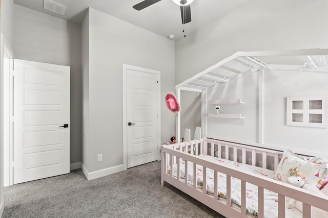 3817 Stonewood Dr, Little Elm, TX 75068 - carpeted bedroom with a nursery area, baseboards, and ceiling fan