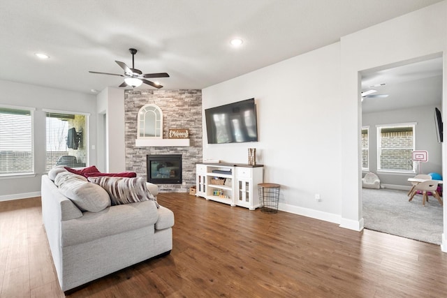 3817 Stonewood Dr, Little Elm, TX 75068 - living room with a ceiling fan, baseboards, a stone fireplace, wood finished floors, and recessed lighting