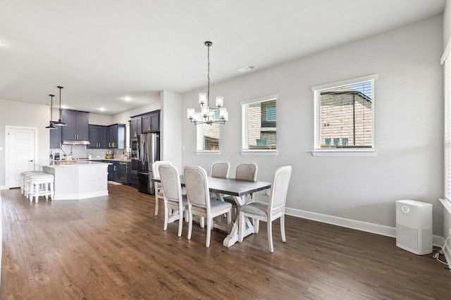 3817 Stonewood Dr, Little Elm, TX 75068 - dining room with a chandelier, dark wood-style floors, baseboards, and recessed lighting