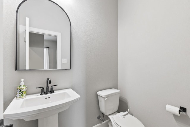 3817 Stonewood Dr, Little Elm, TX 75068 - bathroom with toilet and a sink
