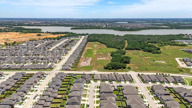 3817 Stonewood Dr, Little Elm, TX 75068 - aerial view of property and surrounding area with a large body of water and nearby suburban area