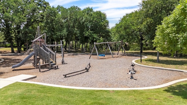 3817 Stonewood Dr, Little Elm, TX 75068 - community play area featuring a yard and view of scattered trees
