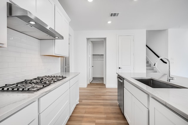 4251 Arlington Ave, Mckinney, TX 75071 - kitchen with extractor fan, stainless steel appliances, a sink, backsplash, and recessed lighting