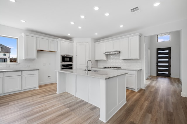 4251 Arlington Ave, Mckinney, TX 75071 - kitchen featuring a sink, oven, decorative backsplash, white cabinetry, and recessed lighting